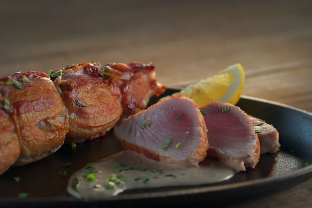 Steven Raichlen grills bacon wrapped tuna on an Arteflame grill